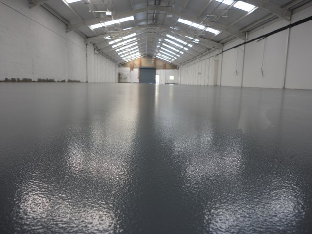 Industrial Smoothing Screed to resurface a floor at Discovery Park Sandwich